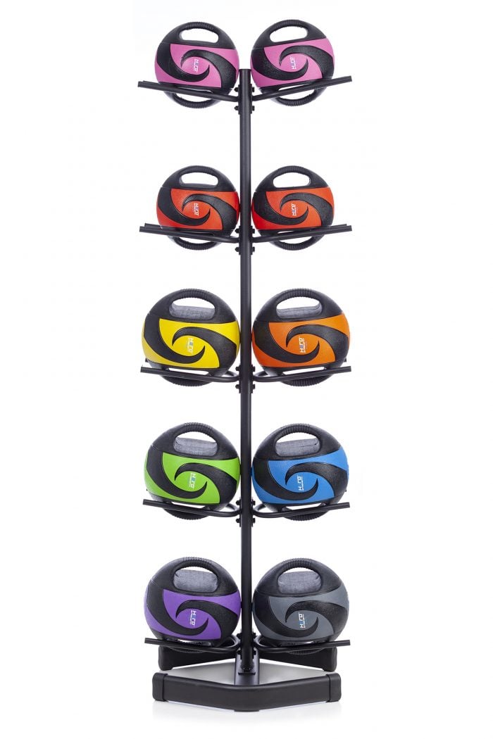 10 remedy balls on a black vertical rack in various colors