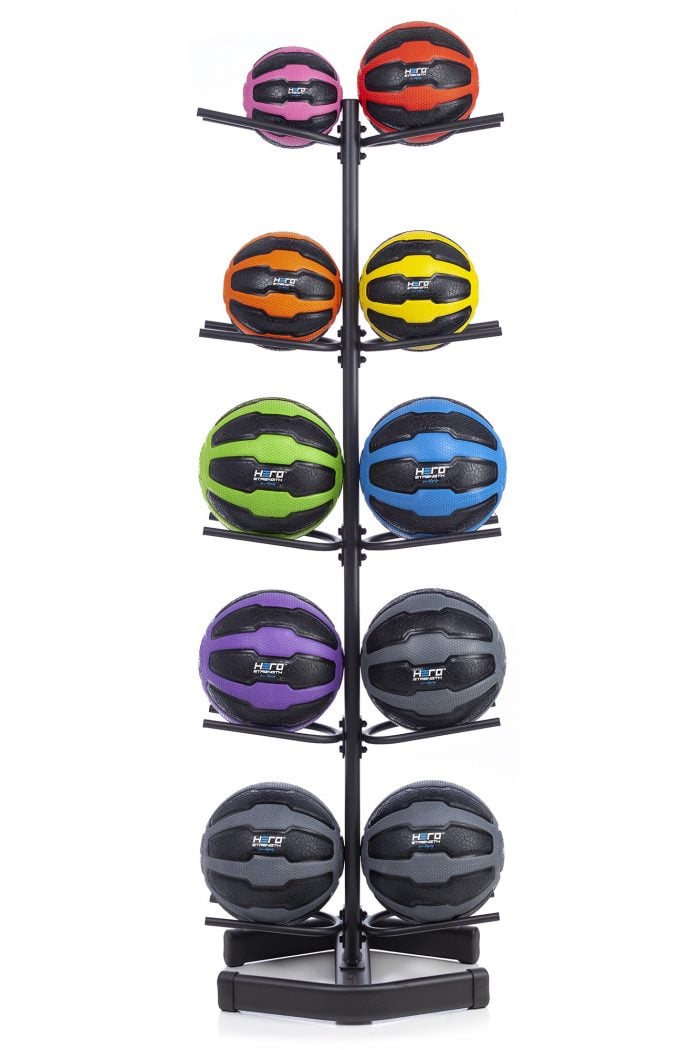 10 remedy balls on a black vertical rack in various colors