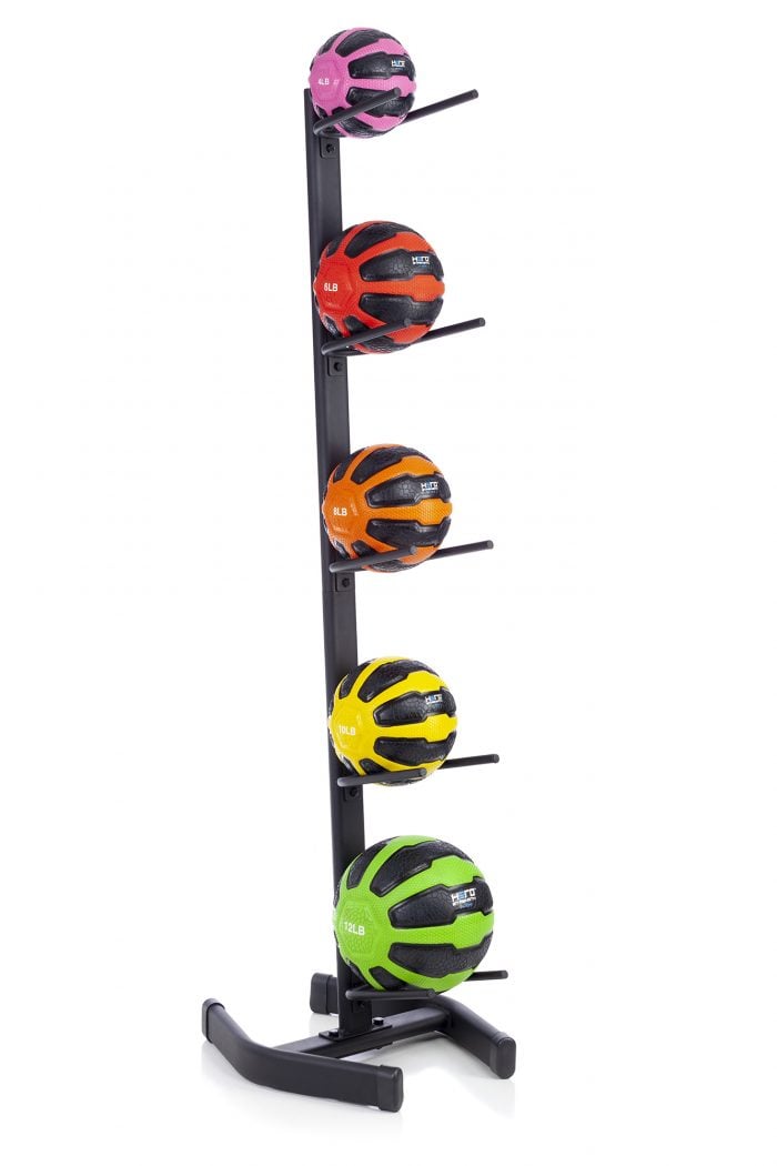5 remedy balls on a black vertical rack in various colors - pink and black, orange and black, yellow and black, green and black