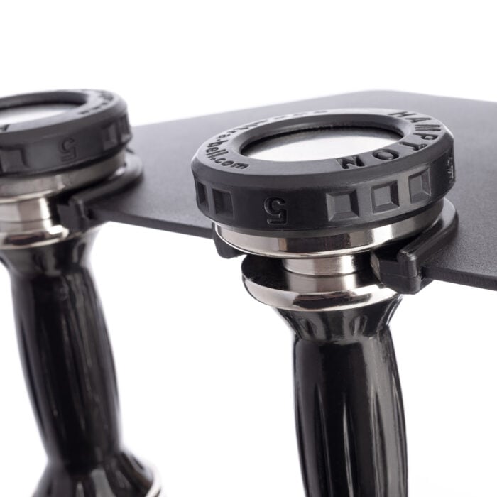 Close up Set of Eclipse Pro Style Dumbbells ranging in weight from 5 to 50 pounds